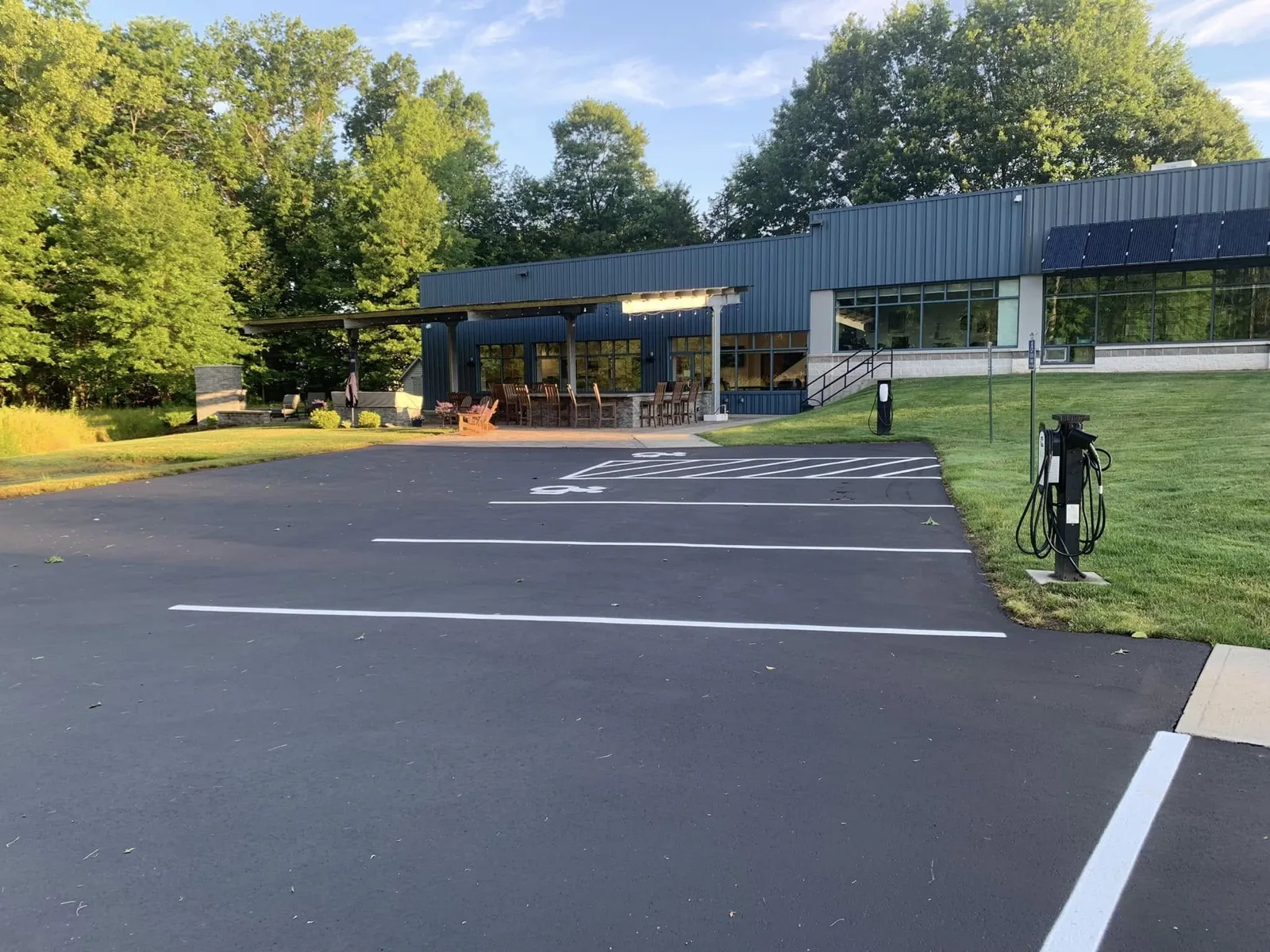 Commercial parking lot sealcoating and line striping with EV charging stations in Connecticut