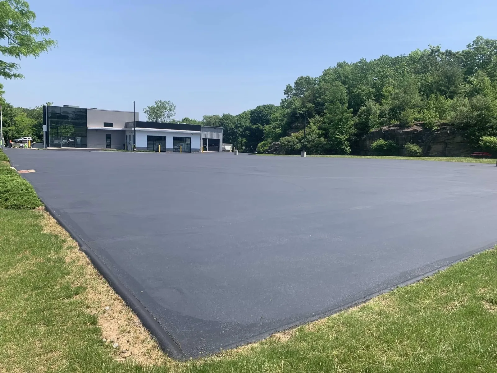 Freshly sealcoated commercial parking lot in Connecticut