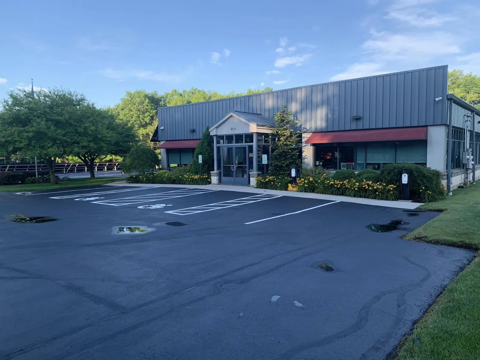 Freshly sealcoated and striped office building parking lot in Connecticut