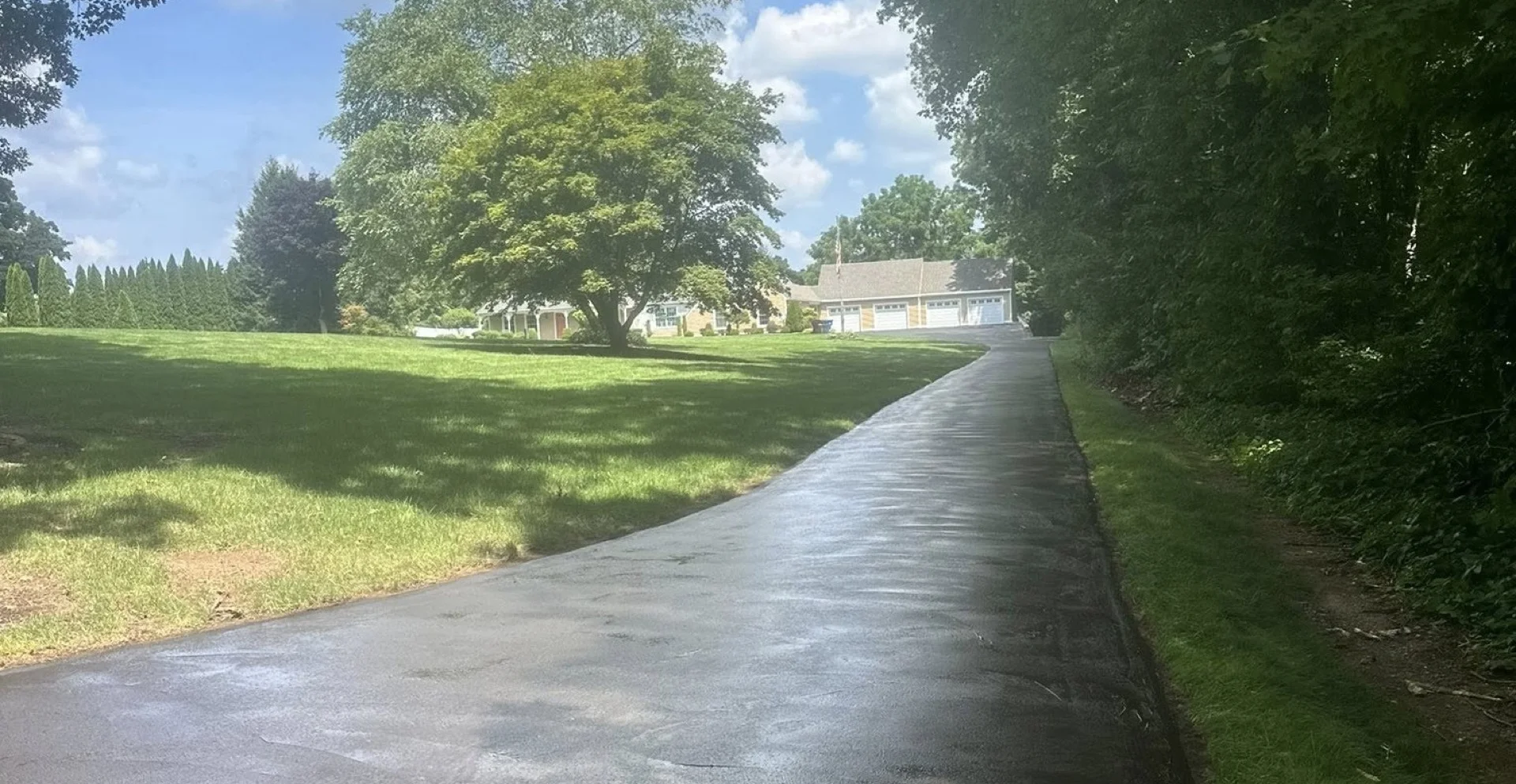 Freshly sealcoated residential driveway